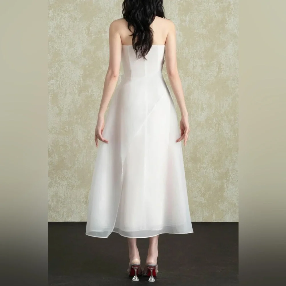 Elegant Strapless White Midi Dress with Draped Bodice - Picture 3 of 7